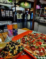 THE VILLAGE FLATBREAD CO.