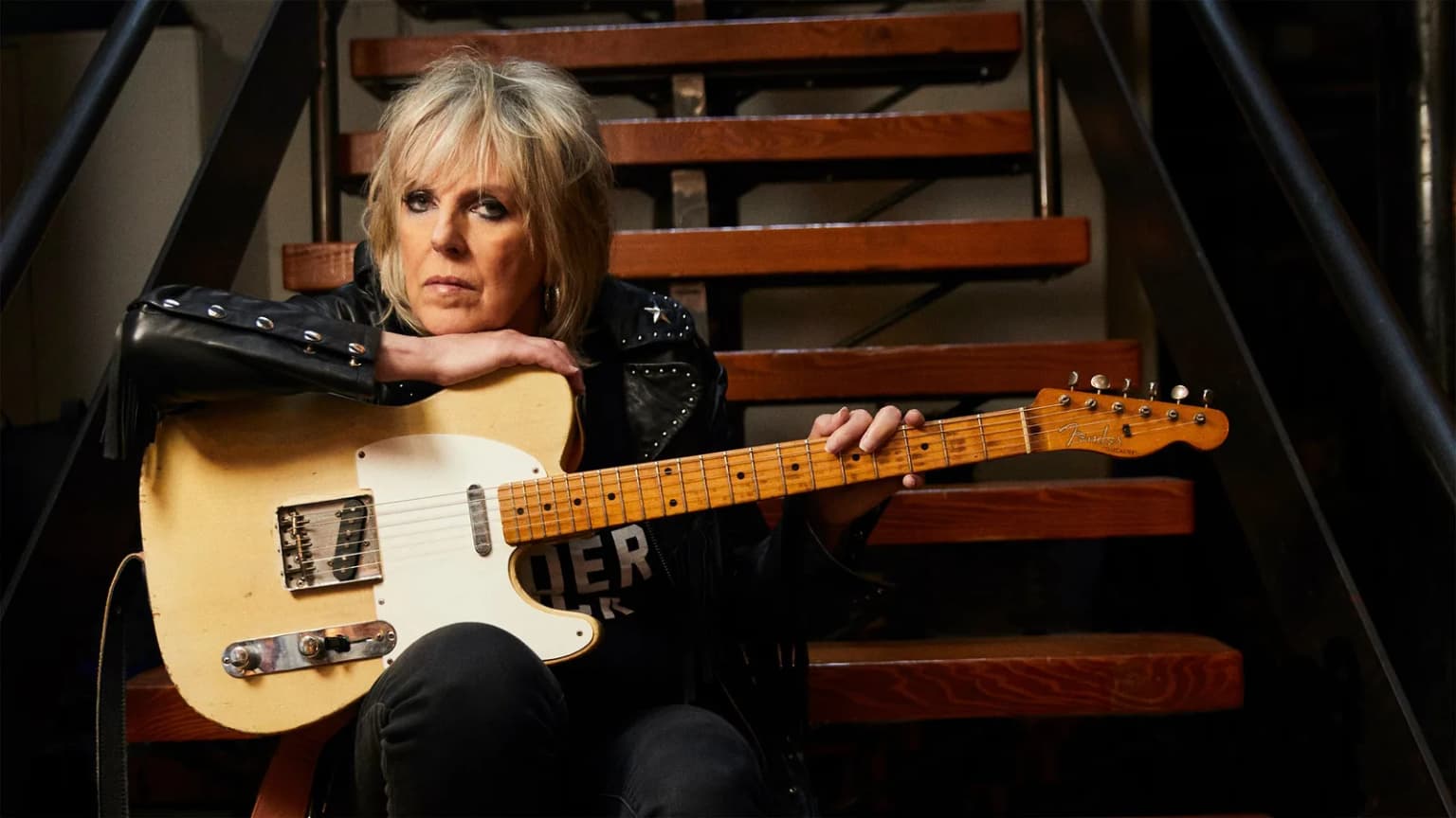 An evening with Lucinda Williams and her band event poster